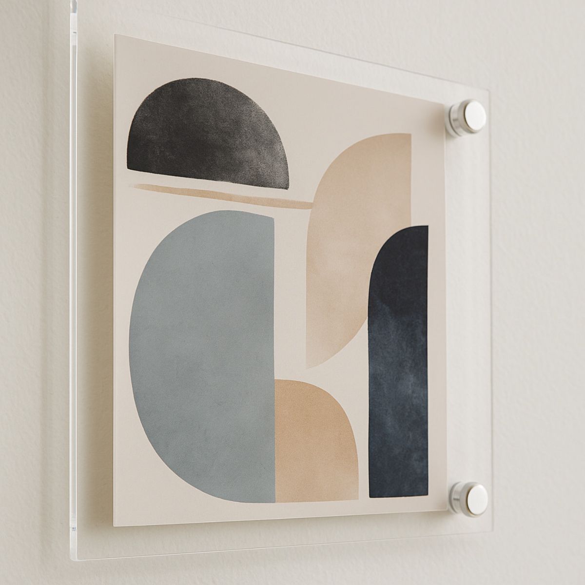 Abstract wall art mounted with clear acrylic standoffs, creating a floating display effect in a modern home interior.